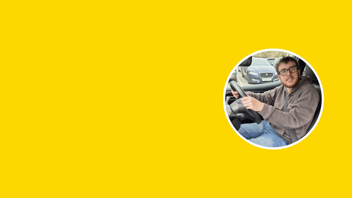 A bright yellow graphic background with a circular inset photo of a man wearing glasses and a brown jacket, sitting in a car and gesturing with his hand.